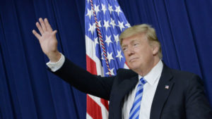 U.S. President Donald Trump waves during a town hall meeting with executives on the America business climate in the South Court Auditorium of the White House in Washington, D.C., U.S., on Tuesday, April 4, 2017. Trump has vowed to flatten regulatory hurdles for American business, and Congress's proposed EPA rules for science would make commerce easier. Photographer: Olivier Douliery/Bloomberg via Getty Images