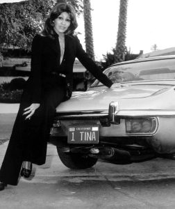 Tina with her beloved silver 1973 Jaguar E Type XKE Bob Gruen 1975