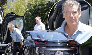 EXCLUSIVE: Pierce Brosnan gets his brand new BMW delivered to his house in Malibu