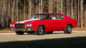 1970-Chevrolet-Chevelle-SS-coupe-454-exterior-001-Mecum-Auctions-Cranberry-Red-white-stripes-driver-front-three-quarter